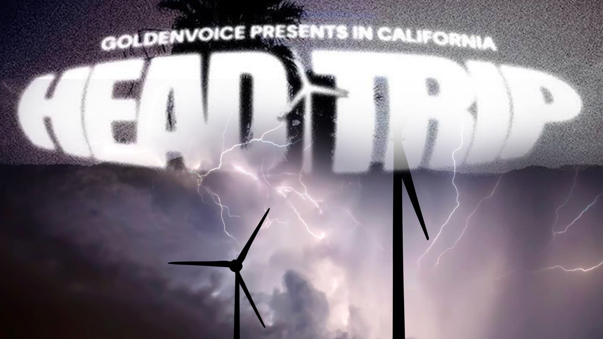 Glowing "HEAD TRIP" text with lightning bolts across a stormy sky and silhouetted wind turbines below.